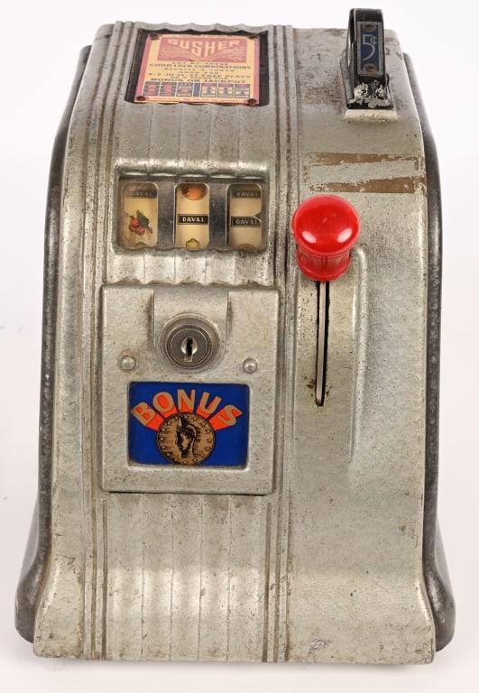 5c DAVAL GUSHER TRADE STIMULATOR: Nice original 3 wheel countertop slot style machine. Good Luck combinations you receive a token for free play or a jackpot. Nice original condition. 9" Excellent Provenance: Rick Frink Collection