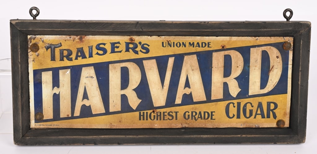 HARVARD CIGAR EMBOSSED TIN SIGN: SST Harvard Cigar embossed tin sign. All original condition. Has some edge wear. Set in wood frame. 15 1/2"x6 1/2" Very Good