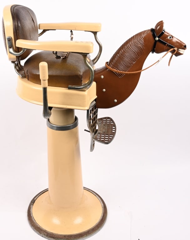 EMIL J PAIDAR CHILD'S BARBER CHAIR WITH HORSE: Outstanding original Emil J Paidar Child's Barber Chair. Super clean condition. Porcelain on chair looks great. All metal trims in nice shape. The Original Horse has been repainted at some point.