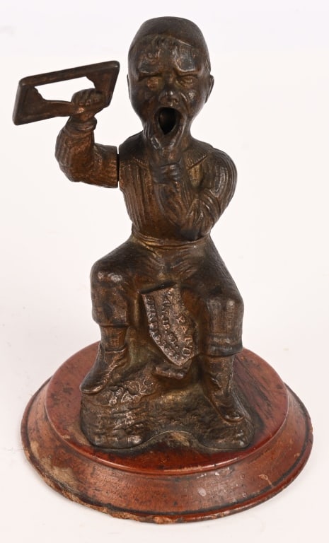 SEATED BOY FUGURAL CIGAR CUTTER (1 of 5)
