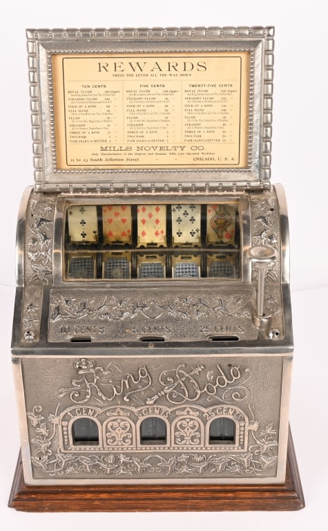 MILLS KING DODO TRADE STIMULATOR: RARE Mills King Dodo Trade Stimulator. Very unusual multi denomination machine accepts 5c, 10c, and 25c. Very clean condition. Very ornate with goddess on case. Still has marquee. Works well when