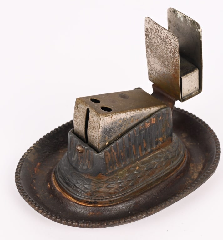 CAST IRON CIGAR CUTTER & MATCHBOX HOLDER: Nice Advertising Specialties cast iron Cigar Cutter with Matchbox Holder. Nice details. 6 1/2" Excellent Provenance: Rick Frink Collection