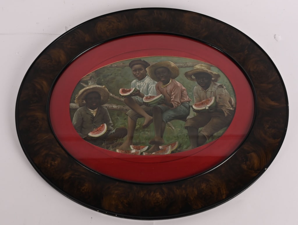 BLACK AMERICANA CHILDREN WITH WATERMELON PRINT: Early Black Americana Children with Watermelon Print. Great colors. Set in oval frame. 25"x22" Excellent