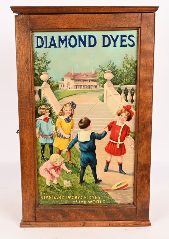 DIAMOND DYES TIN & OAK CABINET: Very nice Diamond Dyes Cabinet. Great oak case with wonderful tin image of children. Very nice colors. Clean condition. Rear door panel is replaced. 25"x15" Excellent