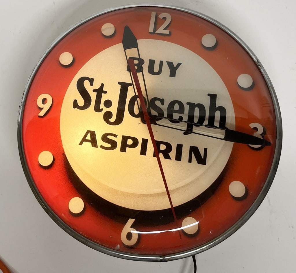 ST JOSEPH ASPIRIN PAM BUBBLE CLOCK: Nice original St Joseph Aspirin PAM Bubble Clock. All original with nice colors. Worked when tested. Missing one bulb cover and dent in back. Displays perfect. 15" Excellent