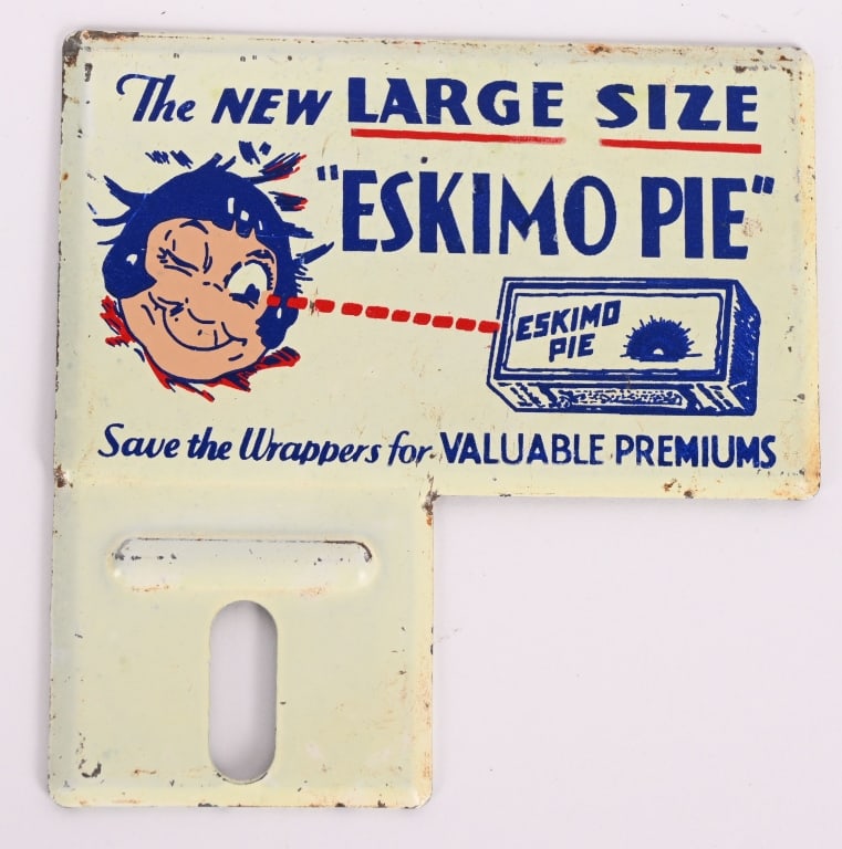 ESKIMO PIE TIN LICENSE PLATE TOPPER: Eskimo Pie Tin License Plate Topper. All original with great graphics and colors. Possibly made for Child's Pedal Car. 3"x3" Excellent