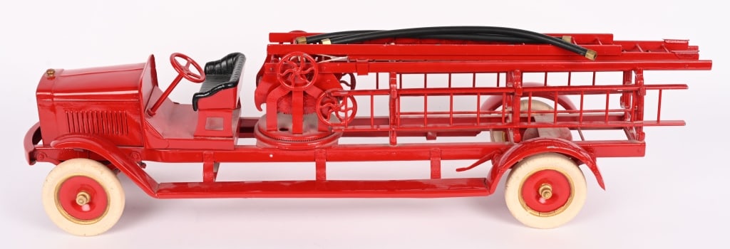 KINGSBURY AERIAL LADDER TRUCK: Beautiful restored Kingsbury Aerial Ladder Truck. Comes with Ladders and Hoses. A large and impressive toy. 34" Excellent