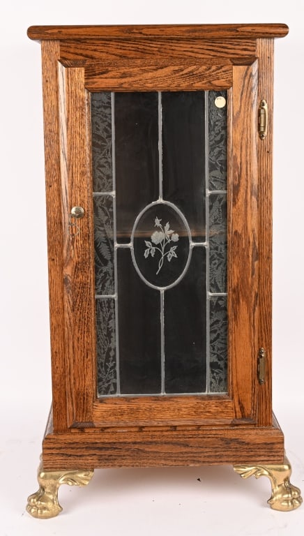 SLOT MACHINE STAND w/ LEADED GLASS DOOR: Contemporary wooden Slot Machine Stand with leaded glass door. Very nice condition with claw feet. 34"x17"x17" Excellent This is not a standard shippable item and will require 3rd party shipping or pi