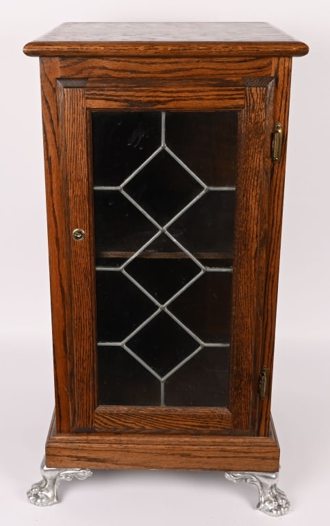 SLOT MACHINE STAND w/ LEADED GLASS DOOR: Contemporary wooden Slot Machine Stand with leaded glass door. Very nice condition with claw feet. 34"x17"x17" Excellent This is not a standard shippable item and will require 3rd party shipping or pi