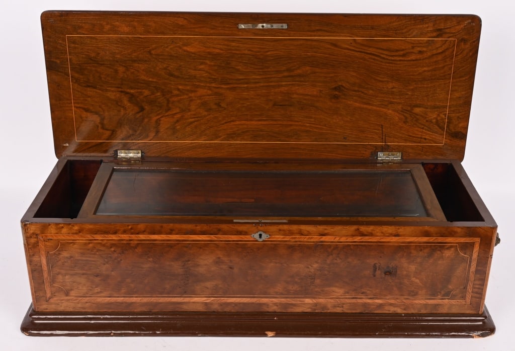 LARGE CYLINDER MUSIC BOX CASE: Large case for a Cylinder music. Likely a Swiss example. There is no original mechanism. Some one install a small Thorens Disc player inside. The case has burled walnut and maple veneers. There is