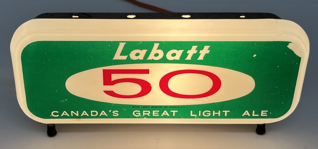 LABATT 50 LIGHT ALE LIGHTUP REGISTER SIGN: Nice Labatt 50 Canada's Great Light Ale lightup Cash Register Sign. All original in great shape. Made by American Signs. Worked when tested. 10"x4" Excellent