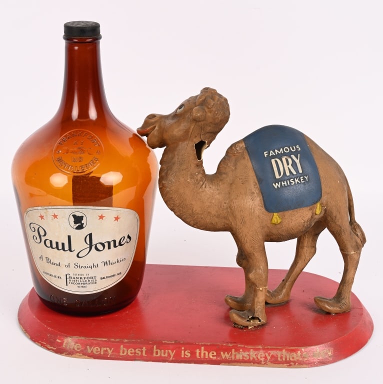 PAUL JONES WHISKEY CAMEL BOTTLE DISPLAY: Paul Jones Whiskey Camel Bottle Display. All original made of wood and composition. Comes with display bottle. 17" Excellent