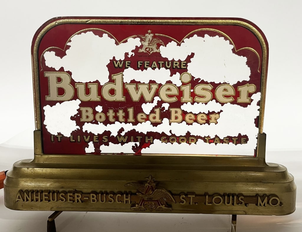 BUDWEISER BEER REVERSE PAINTED LIGHTUP SIGN: Budweiser Beer reverse painted glass lightup shelf sign. All original with significant flaking. Worked when tested. Base is clean. Brewed in St Louis, MO. 17"x12" Very Good