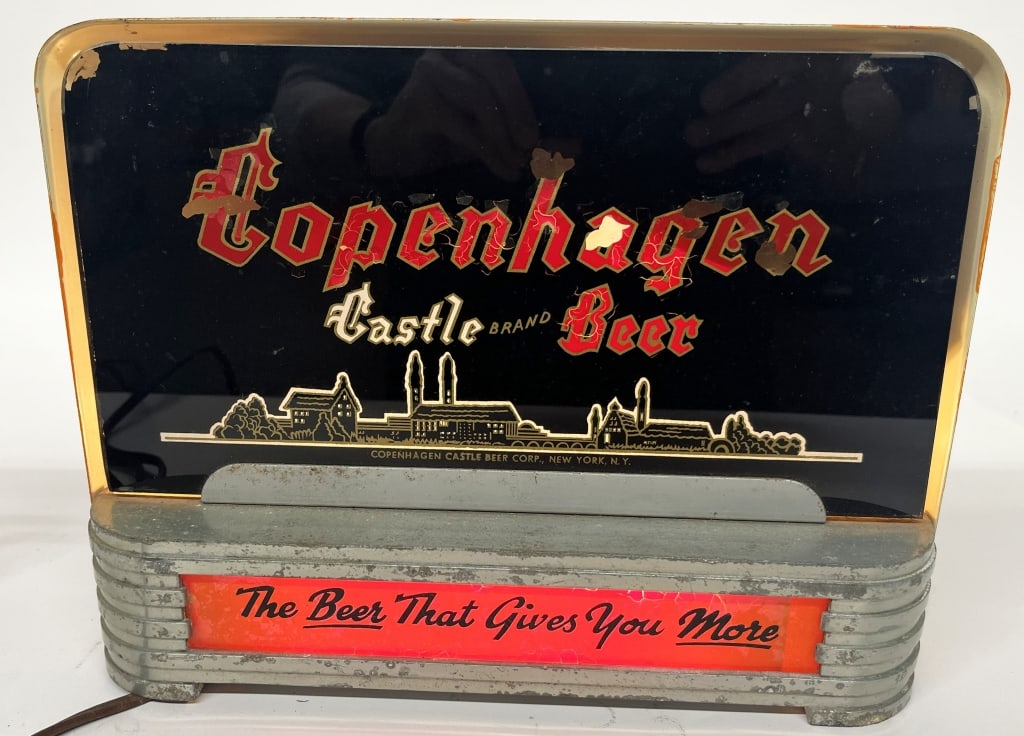 COPENHAGEN BEER REVERSE GLASS LIGHT-UP SIGN: Copenhagen Beer reverse painted glass deco style shelf Sign. Glass has some minor loss. Back is repainted. Worked when tested. Brewed in New York, NY. 12"x9 1/2" Very Good