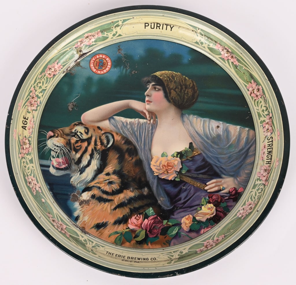 ERIE BREWING CO. ADVERTISING TRAY: Erie Brewing Co. Advertising Tray. Great image of woman with tiger. Has great colors. Brewed in Erie, PA. 13 1/2" Excellent