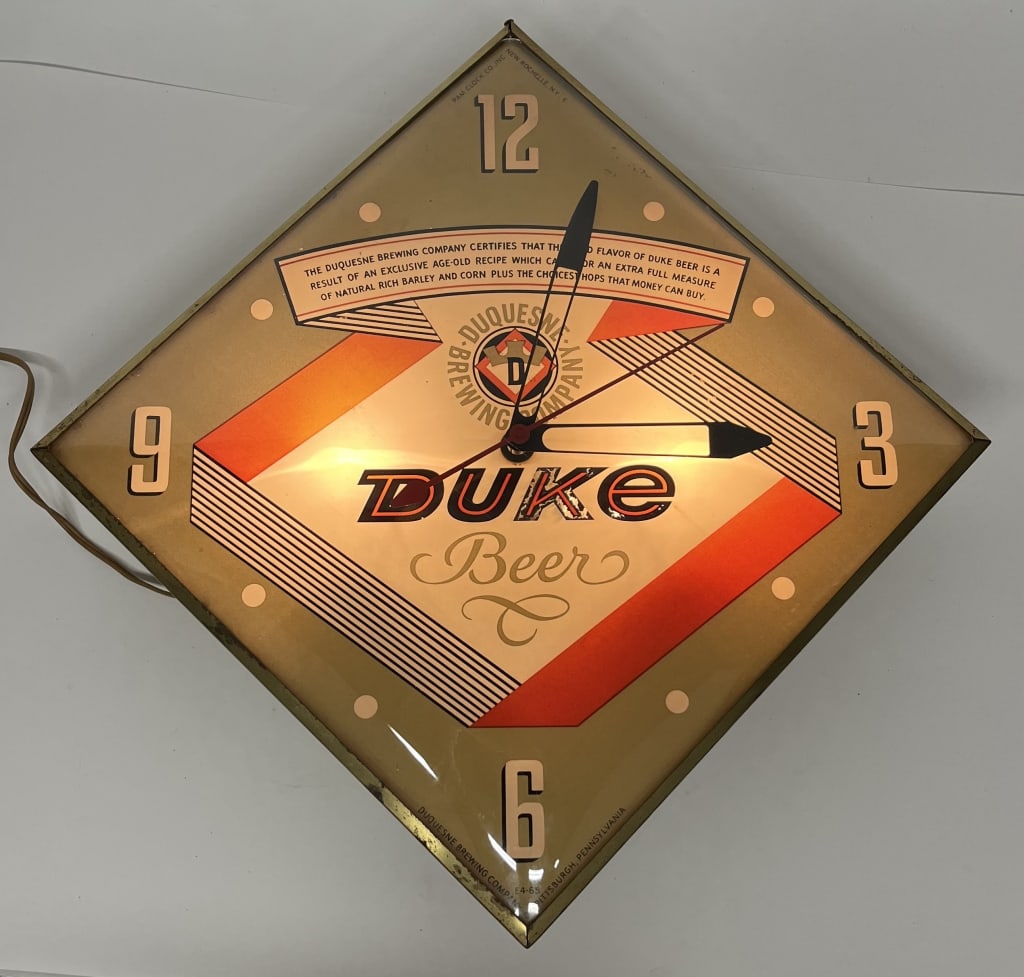 DUKE BEER PAM CLOCK: Duke Beer PAM Clock. All original in nice shape. Worked when tested. Brewed in Pittsburg, PA. 15" Excellent