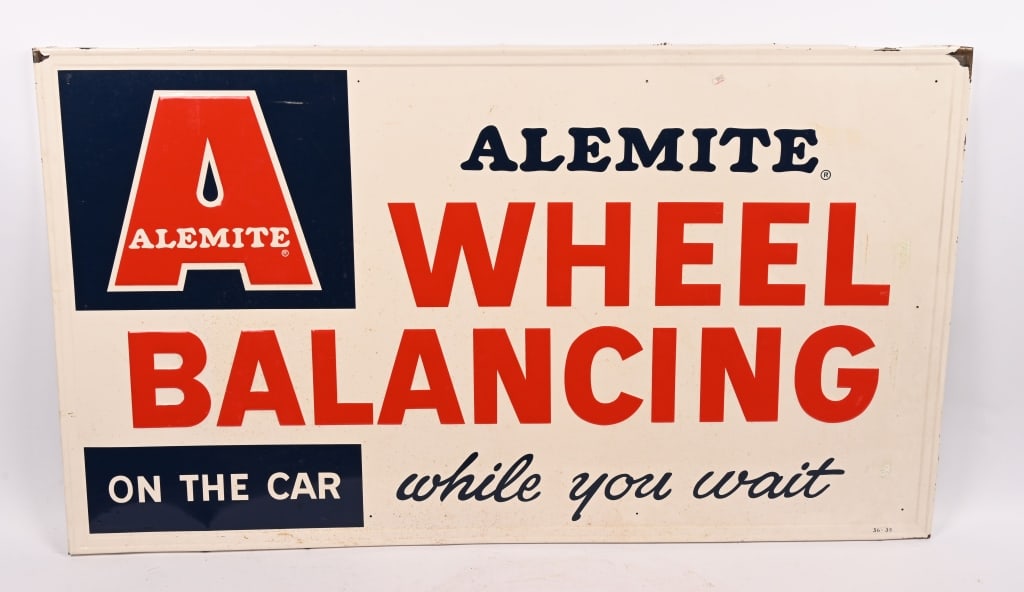 ALEMITE WHEEL BALANCING EMBOSSED TIN SIGN: SST Alemite Wheel Balancing embossed tin Sign. All original with nice colors. Clean condition. Marked 36-35 along bottom edge. 56"x32" Excellent