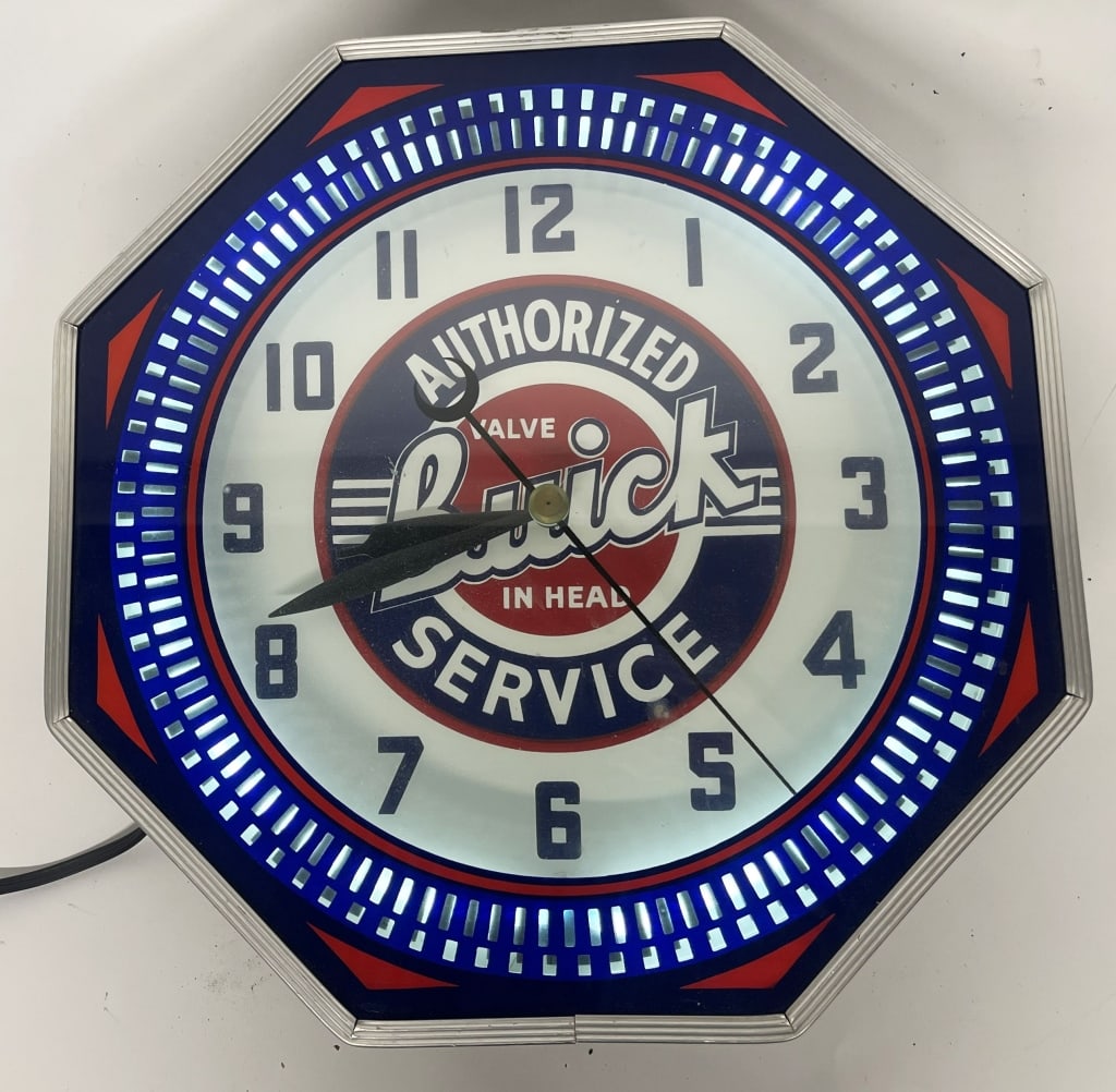 BUICK SERVICE NEON SPINNER CLOCK: Modern clock. Nice colors. Worked when tested. 18" Excellent