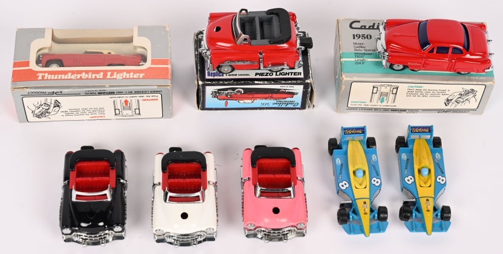 8- FIGURAL AUTO LIGHTERS, 3 BOXED: Nice lot includes 5 Piezo Cadillac lighters, 2 with original boxes, a Piezo Thunderbird lighter with box, and 2 Telofonic Race Car lighters made in China. Excellent