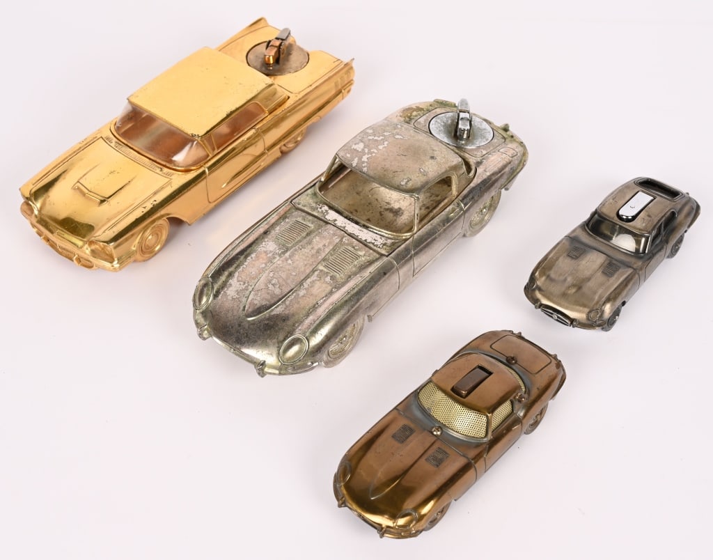 4- VINTAGE DIECAST FIGURAL AUTO LIGHTERS: Lot includes: 1. 9" Jaguar lighter, cigarette holder, worn finish, removable top has break in back. Good, 2. 8 3/4" Thunderbird, nice condition with removable top and lighter has T-Birds embossed on
