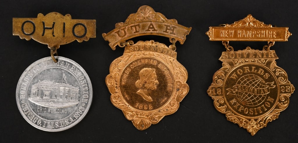 7 COLUMBIAN EXPOSITION BADGES - 7