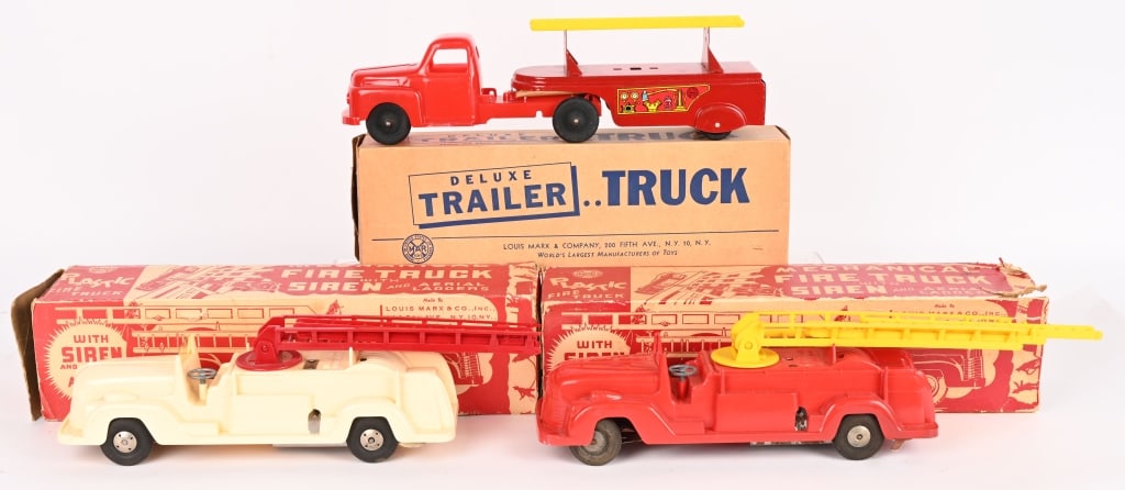 3- MARX FIRE TRUCKS w/ BOXES: Includes 2 Mechanical Fire Trucks with Sirens, and Fire Ladder Truck with only 1 Ladder. All in Boxes. 15" Excellent