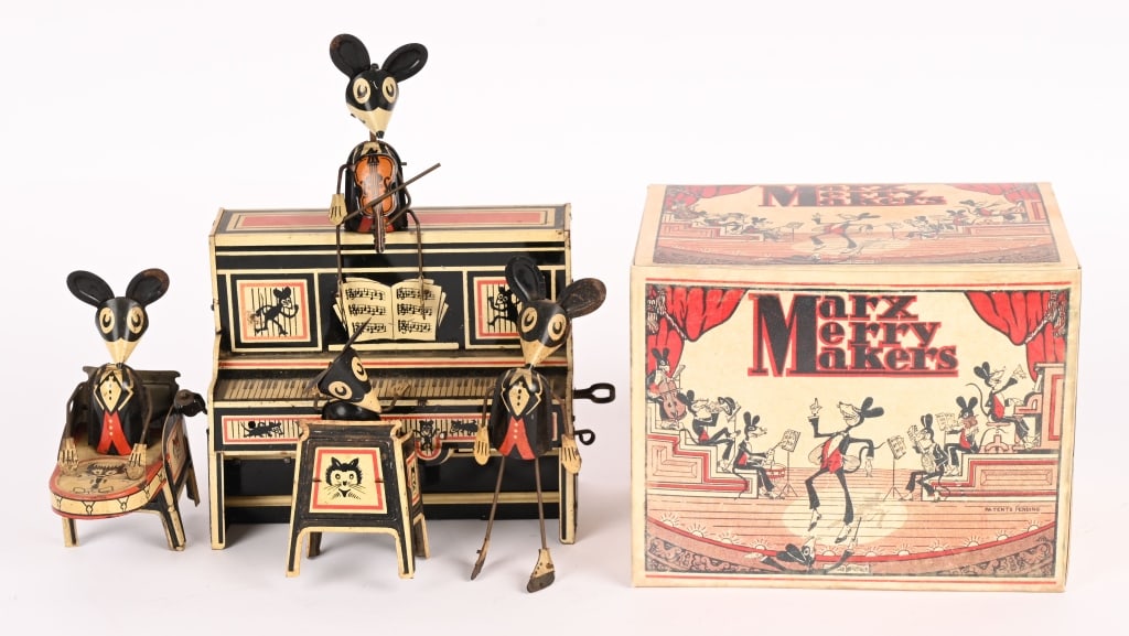 MARX TIN WINDUP MERRY MAKERS BAND: All original and complete. Has violin player mouse. Windup works. Comes with reproduction Box. 9" Excellent