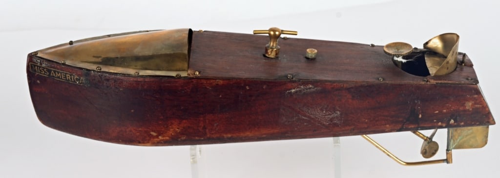 MANGAL WINDUP PLAYTHINGS SPEED BOAT: Nice early wood and brass Boat. Windup works. 14" Excellent