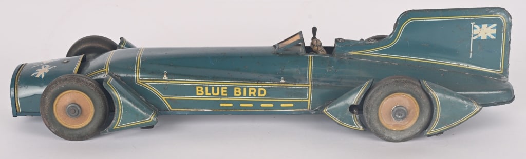 GUNTHERMANN WINDUP CAMPBELL'S BLUE BIRD RACER: Nice German clockwork race car. All original condition. Has some patina. Windup works. 20" Very Good-Excellent