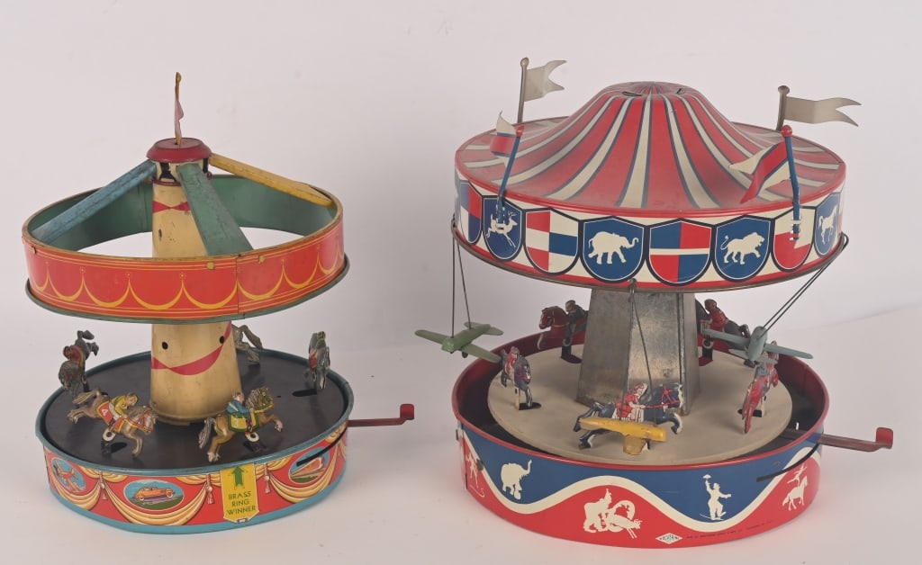 2- WOLVERINE TIN WINDUP MERRY GO ROUNDS (1 of 7)