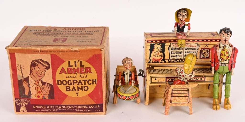 UNIQUE ART TIN WINDUP LIL ABNER BAND w/ BOX: All original and complete. Nice colors and graphics. Clean and working condition. Boxed. 9" Excellent