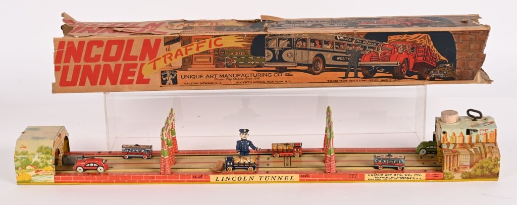 UNIQUE ART TIN WINDUP LINCOLN TUNNEL: All original in clean condition. Works. With partial Box. 23" Excellent