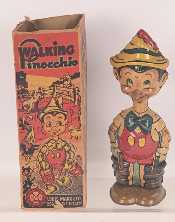 MARX TIN WINDUP PINOCCHIO w/ BOX: All original in great shape. Scarce version with moving eyes. Works. Boxed 9" Excellent