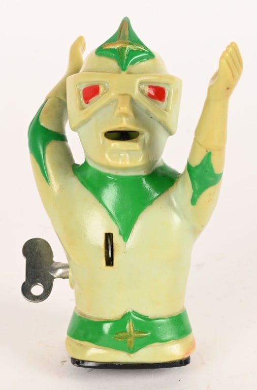 YONE TIN WINDUP VINYL MIRROR MAN: Japan tin windup Vinyl Mirror Man. All original and in great condition. Windup works. 4 1/2" Excellent