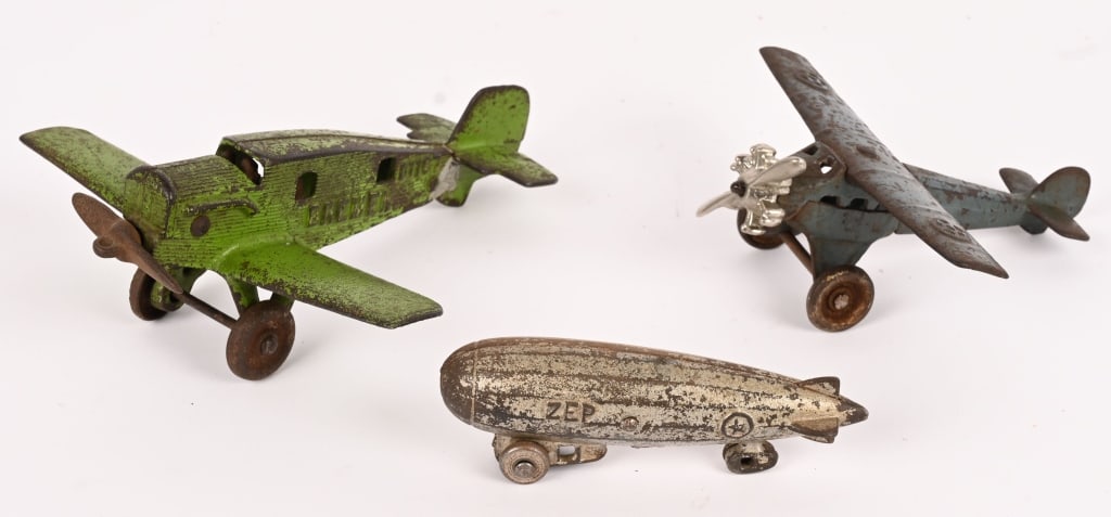 CAST IRON AIRPLANES & BLIMP (1 of 8)