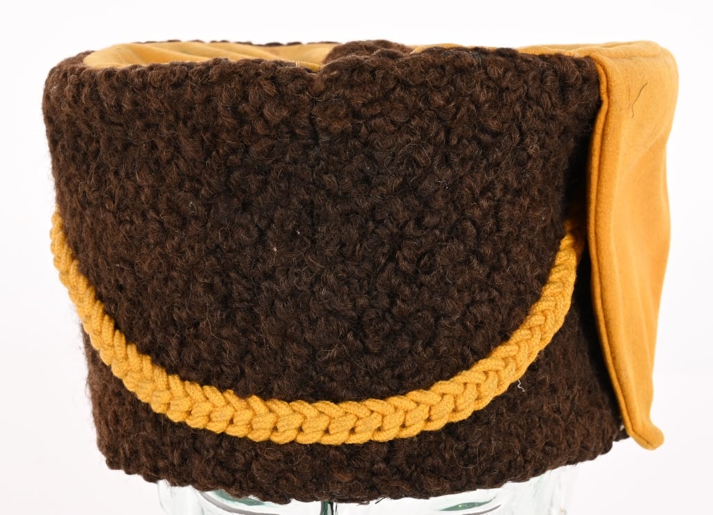 19TH CENT. NEW YORK HUSSARS ASTRAKHAN BUSBY HAT: This busby was part of the dress uniform of the New York Hussars, organized in 1885 as an independent troop of cavalry (National Guard New York, 1889).This is a bell crown busby with black astrakhan f