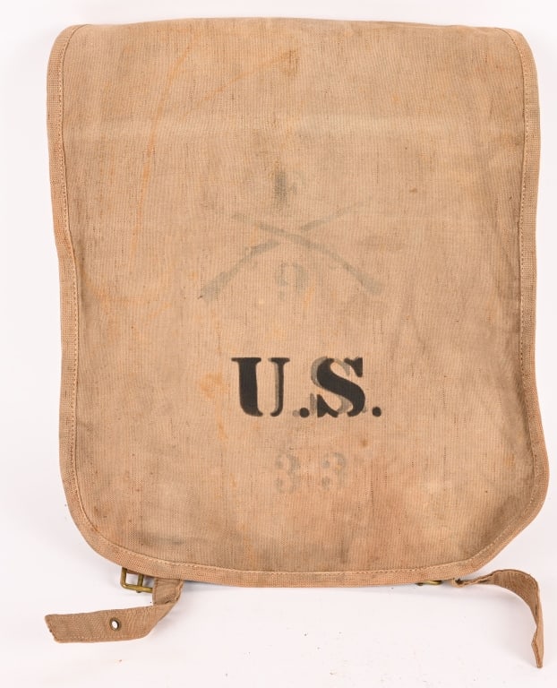 SPANISH AMERICAN WAR CANTEEN AND HAVERSACK LOT: Lot of two Spanish American War items to include a haversack and canteen. The cover on the canteen shows wear. The haversack is unit marked 4th Infantry 9th Company 