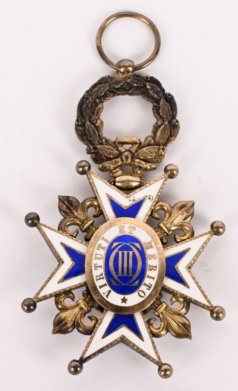 KINGDOM OF SPAIN ORDER OF CHARLES III KNIGHT 1900: (Real y Muy Distinguida Orden de Carlos III). Instituted in 1771. In silver gilt and enamels, a Maltese cross in blue and white enamel, with fleur de lys in each quadrant, surmounted by a wreath, the 