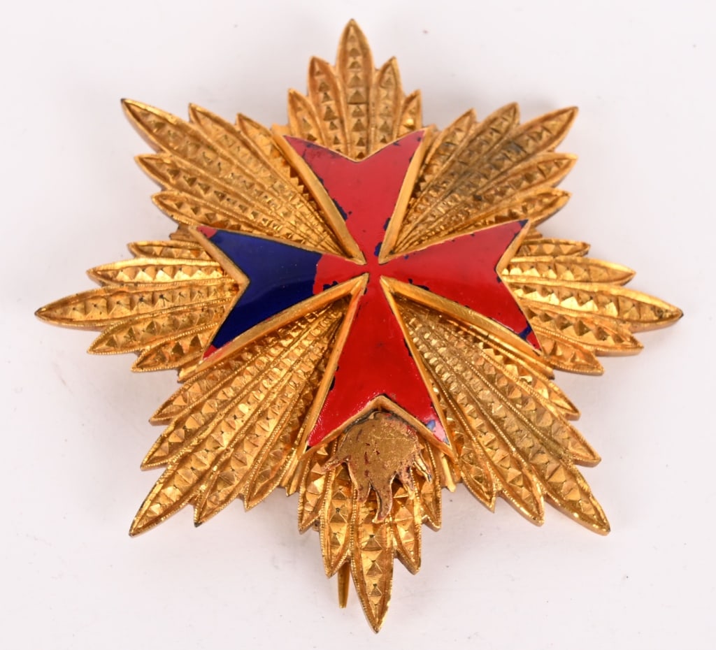 SWEDISH ORDER OF ST. BRIDGET BREAST STAR: Instituted in 1366. In silver gilt, eight-pointed star superimposed on a Maltese cross in red and blue enamel with flame. Excellent. The Military Order of the Most Holy Saviour of Saint Bridget of Swe