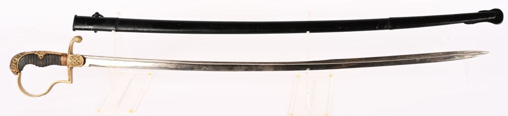 IMPERIAL GERMAN ARTILLERY OFFICERS SWORD: Beautiful Imperial German Artillery Officers Sword measuring 40 inches overall with a 33 inch, slightly curved blade etched Eisenhauer and is maker marked stamped to WKC, The blade is very clean and u