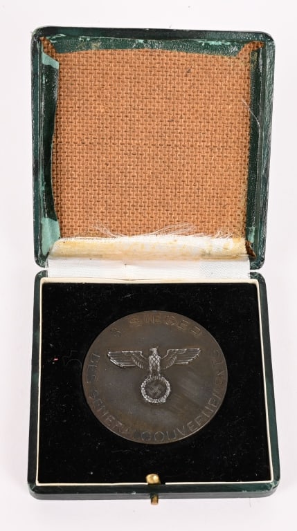 WWII NAZI GERMAN SPORTS NON PORTABLE AWARD WW2: WWII Cased Nazi Non Portable Award with the case measuring 3 7/8 X 3 7/8 inches The medallion depicts an athlete holding a laurel wreath and to the reverse a large National Eagle to the center holding