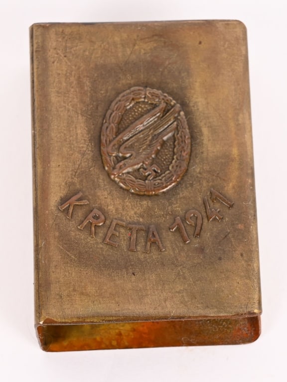 WWII NAZI GERMAN PARATROOPER MATCH SAFE KRETA 1941: WWII Nazi German Fallschirmjäger Match Safe from Kreta 1941. This brass match safe coremorates the German Paratroopers at the battle of Crete embossed with a Fallschirmjäge Badge. Excellent.