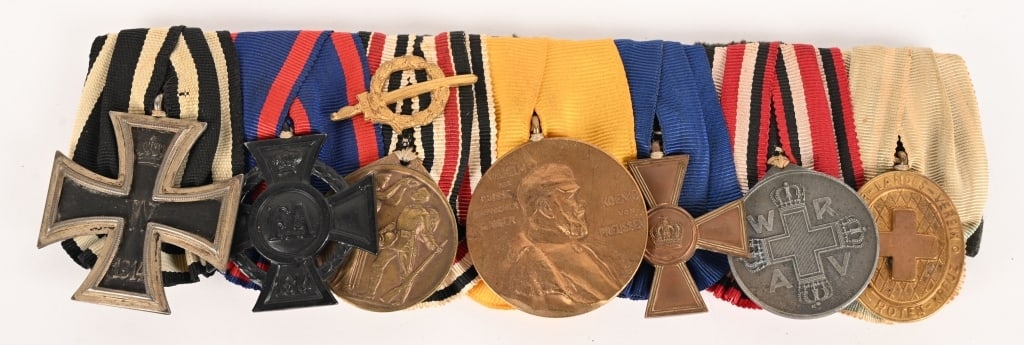 WWI IMPERIAL GERMAN COMBAT MEDIC 7 PLACE MER: Imperial German 7 place medal bar to include 1) IRON CROSS 2ND CLASS. 1914 pattern, die struck, three piece, iron and alloy construction Pattée style cross with a single piece iron core and