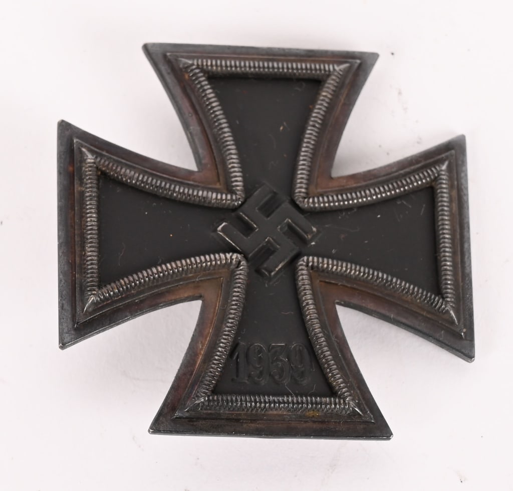 WWII NAZI GERMAN IRON CROSS 1ST CLASS MKD 1 800: IRON CROSS 1ST CLASS, 1939 BY DESCHLER WITH SILVER CONTENT MARKED 800. Die struck magnetic construction Patté style cross. Obverse of award features an embossed central canted swastika and re-ins