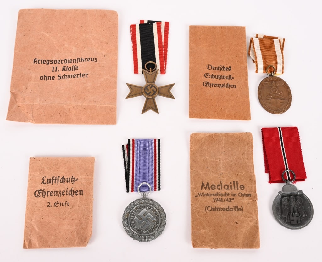 WWII NAZI GERMAN MEDAL LOT W PACKETS NSDAP WW2: Lot of WWII Nazi German Medals with Packets to include 1) CIVIL AIR DEFENCE HONOR DECORATION 2ND CLASS, 1938. Roughly, 38m diameter, early, die struck aluminum construction award. The circular award f