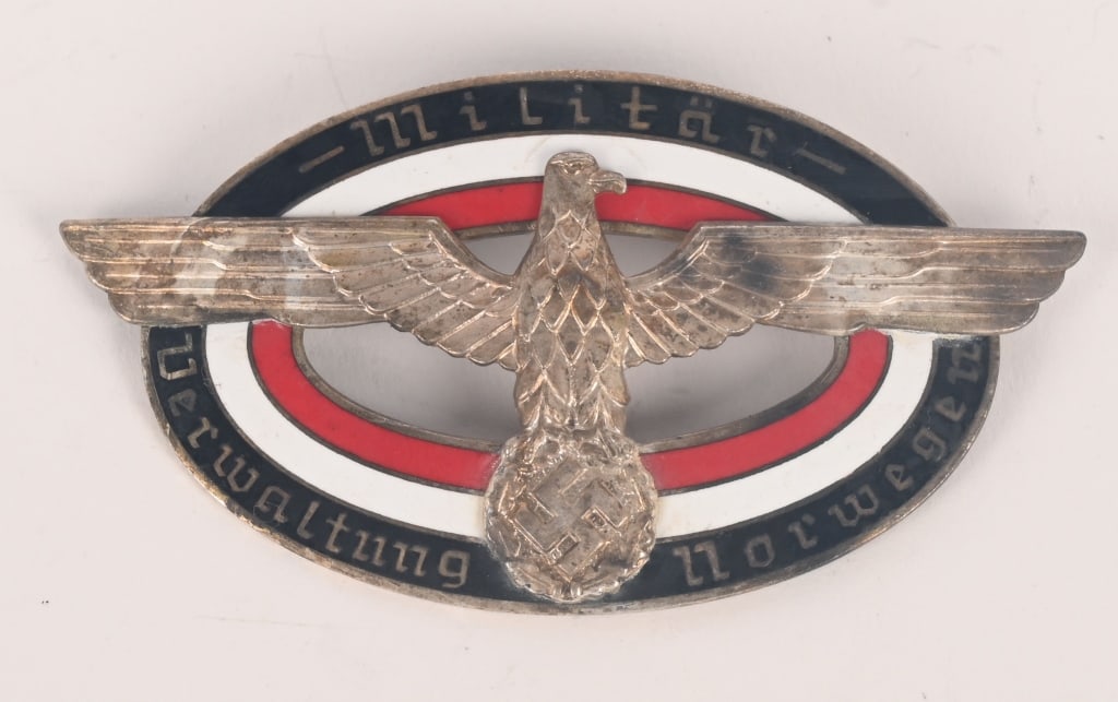 WWII NAZI GERMAN ADMIN BADGE OF NORWAY WW2: Badge Of The Military Administration Norway (Militär Verwaltung Norwegen). Large size badge, in bronze, silvered, and enameled, 74.5mm x 40.4mm, numbered “703”, excellent quality with