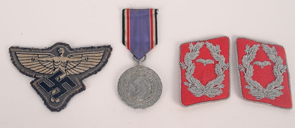 WWII NAZI GERMAN LUFTWAFFE INSIGNIA LOT NSFK DLV: WWII Nazi German Insignia lot to include 1) NSFK SLEEVE/BREAST INSIGNIA. Machine embroidered NSFK national emblem consisting of a winged man, (Icarus), in pale gray threads with black accent threads w