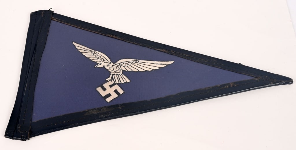 WWII NAZI GERMAN LUFTWAFFE OFFICERS CAR PENNANT: Roughly, 23cm tall at the hoist end, 40cm long, horizontal, isosceles triangle, woven, dual-ply, Luftwaffe blue cotton construction pennant features a nicely detailed, machine embroidered, second patt