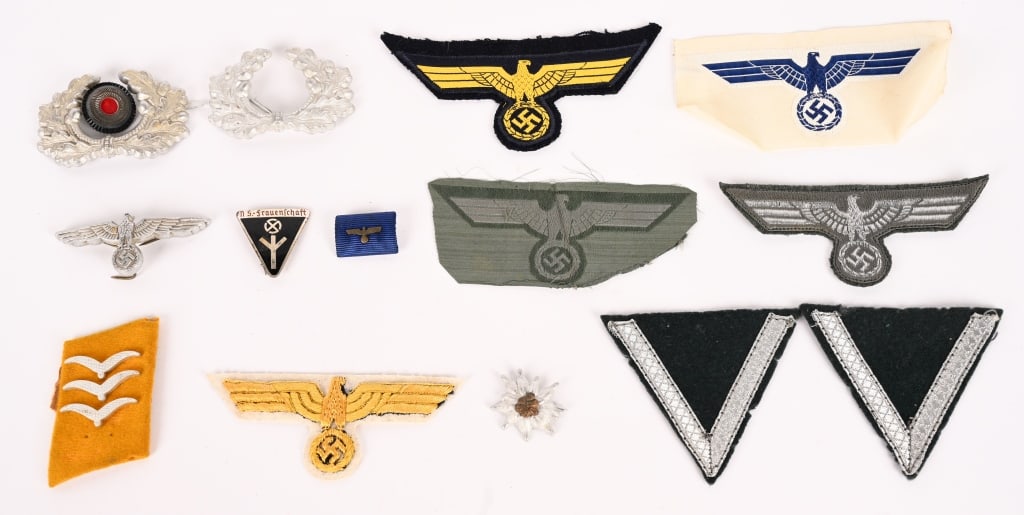 WWII NAZI GERMAN INSIGNIA LOT NAVY ARMY NSDAP: Lot of WWII Nazi German insignia lot to include 1) KRIEGSMARINE EM/NCO'S BREAST EAGLE. Machine woven national eagle in golden yellow cotton threads on a cut-out woven, navy blue, rayon base. The eagle