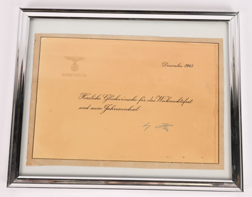 WWII NAZI GERMAN CHRISTMAS CARD FROM ADOLF HITLER: December 1943 Christmas Greeting Card from Adolf Hitler that measures 5 X 8 inches having a gold National Eagle in the upper left corner with ADOLF HITLER . To the upper right Dezember 1943. Below tha